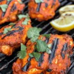 Tandoori chicken is a beloved dish that has gained international fame for its bold flavors and vibrant colors. Originating from India, this dish is deeply rooted in the culinary traditions of the Indian subcontinent and is often associated with festive celebrations and communal gatherings. The name "tandoori" comes from the traditional clay oven known as a "tandoor," where the chicken is typically cooked at high temperatures, giving it a distinct smoky flavor and charred exterior.