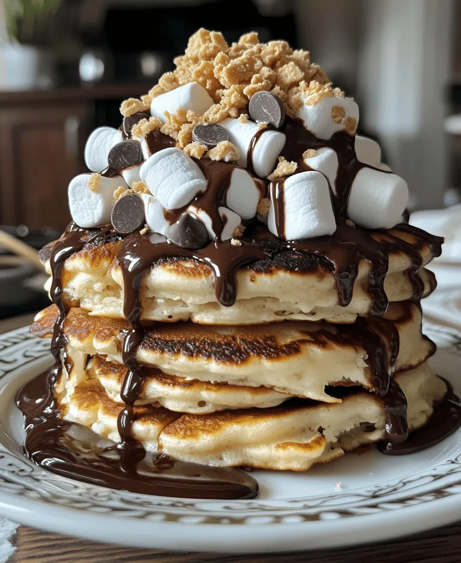 Imagine waking up to the sweet aroma of pancakes, with the nostalgic flavors of campfire S’mores wafting through your kitchen. The S’mores Pancakes Delight is more than just a breakfast; it’s an experience, a delightful fusion of two beloved treats that will transport you back to summer nights spent around the fire. These pancakes combine the gooeyness of melted marshmallows, the richness of chocolate, and the crunch of graham crackers, creating a heavenly breakfast that appeals to both the young and the young-at-heart.