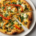 Explore a delightful fusion of flavors with Tofu Curry Pizza Delight—a vegetarian pizza that combines the savory richness of a curry dish with the fun of a classic pizza. This unique dish takes the wholesome nature of tofu and melds it with fragrant spices, creating an exciting topping that sits perfectly atop a smooth, homemade pizza crust. Whether you’re hosting friends for a laid-back dinner party or looking for a fun weeknight meal, this recipe is guaranteed to impress.