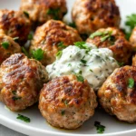 Savory Greek Turkey Meatballs with Tzatziki Sauce bring a touch of the Mediterranean into your home kitchen, offering vibrant flavors that are both satisfying and nutritious. Originating from the heart of Greek cuisine, these meatballs are notable for their rich blend of herbs and spices, perfectly paired with a creamy, tangy tzatziki sauce that elevates the overall dining experience. Made from ground turkey and whole wheat breadcrumbs, this dish represents a delicious fusion of health and flavor, making it an ideal option for family dinners or casual gatherings.