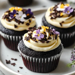 Velvet Noir Cupcakes are a decadent treat that combines the rich flavors of chocolate with a striking visual appeal. The allure of these cupcakes lies not only in their sumptuous taste but also in their deep, dark appearance achieved through the use of black food coloring. This unique aspect sets them apart from traditional chocolate cupcakes, making them a showstopper at any gathering. Whether you’re celebrating a special occasion or just treating yourself to something sweet, these cupcakes are sure to impress guests with both their flavor and aesthetic.