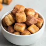 Churro bites are a delightful twist on the classic churro, offering all the crunchy, sugary goodness in bite-sized pieces. These airy morsels are sure to become a favorite for dessert lovers and snack enthusiasts alike. The beautiful golden-brown hue paired with the irresistible sweetness of cinnamon sugar makes these churro bites a treat for all ages. Their petite size not only makes them perfect for sharing but also creates a fun, interactive dining experience, especially for kids.