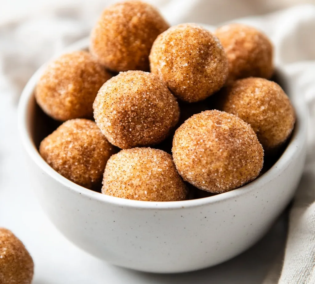 As the cozy autumn season sets in, the flavors of pumpkin and spices fill the air, making it the perfect time to indulge in seasonal treats. However, just because you want to enjoy a sweet delight doesn't mean you need to sacrifice your health goals. The No-Bake Protein-Packed Pumpkin Snickerdoodle Bites are a delicious solution that perfectly balances nutrition and flavor. These bites capture the classic snickerdoodle taste with a twist of pumpkin, making them ideal for anyone craving a wholesome snack.