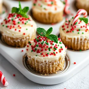 The holiday season calls for delightful treats that are easy to prepare yet impressively festive. One such treat is the Festive No-Bake Mini Cheesecakes, a simple yet elegant dessert perfect for Christmas gatherings. The light and creamy nature of these cheesecakes, coupled with a crunchy graham cracker crust, makes them an appealing choice for dessert tables, festive parties, or family get-togethers. Not only do they offer a rich taste experience, but their delightful presentation, adorned with festive decorations, elevates them to a visually stunning centerpiece.