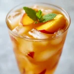 Honey Ginger Peach Tea is the perfect beverage to enjoy during the warm summer months, offering a refreshing twist that quenches your thirst while delighting your taste buds. This tea seamlessly combines the sweet, juicy flavor of ripe peaches with the zesty warmth of ginger, creating a symphony of flavors that are both invigorating and rejuvenating. The addition of honey not only enhances the sweetness but also brings with it a touch of natural goodness that balances the tea beautifully.