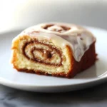 Cinnamon Roll Cake Delight is an indulgent treat that masterfully combines the warm, comforting flavors of cinnamon rolls with the ease and convenience of a cake. This delightful dessert features a moist cake infused with a sweet cinnamon swirl, topped off with a luscious cream cheese glaze. Perfect for breakfast, brunch, or dessert, this cake can transform any occasion into a festive celebration. Whether you're enjoying a cozy morning at home or bringing a dish to a potluck, Cinnamon Roll Cake Delight will surely impress all who get a taste.