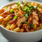 BBQ Chicken Macaroni and Cheese in the Slow Cooker is a comforting dish that perfectly marries the smoky and tangy flavors of barbecue with the creamy, cheesy goodness of macaroni and cheese. This recipe offers an effortless solution for families seeking a hearty meal without the fuss of elaborate cooking. Slow cooking enhances flavors, allowing the ingredients to meld together beautifully, making each bite a delightful experience.