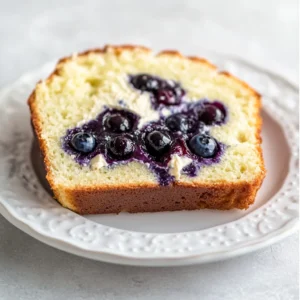 The delightful blend of blueberries and cream cheese in a beautifully baked bread creates a comforting treat that’s ideal for any occasion. This Blueberry Cream Cheese Delight Bread is a harmonious fusion of flavors and textures, offering sweetness from the blueberries, richness from the cream cheese, and a tender crumb. Perfect for breakfast, brunch, or an indulgent snack, this recipe is easy to follow and results in a loaf that is both visually appealing and deliciously satisfying.