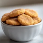 Baking has an incredible way of filling the kitchen with warmth and delightful aromas, and nothing quite compares to the joy of baking Snickerdoodle cookies. These cookies are distinguished by their soft texture and the signature cinnamon-sugar coating. They are not just any cookie; they possess a nostalgic charm that transports you to simpler times, making them an irresistible treat in any setting. Whether you're hosting a casual gathering or enjoying a cozy evening at home, Snickerdoodle Delight Cookies are the perfect companion.