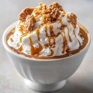 The magic of winter evenings calls for a warm, delightful beverage that encapsulates the essence of the season. Gingerbread Caramel Hot Cocoa Delight is a luxurious twist on traditional hot chocolate, combining the rich flavors of cocoa with the festive spices of gingerbread and a sweet caramel finish. This sweet drink not only warms you from the inside but also captures the holiday spirit in every sip. The aromatic blend of spices along with the creamy texture will surely evoke cozy memories and create new ones among family and friends.