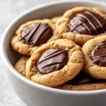 The appeal of sweets often lies in their texture and taste, and what better way to satisfy those cravings than with a delightful batch of Mini Peanut Butter Cup Cookies? These treats are a perfect mix of rich peanut butter, sugary sweetness, and the heavenly allure of chocolate—all conveniently packed into a mini cookie form. Whether you’re preparing a treat for a gathering, a sweet surprise for family, or simply indulging in a personal reward, these cookies bring together beloved flavors in a unique and satisfying way.