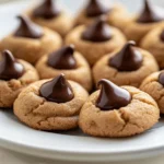 The richness of peanut butter blends perfectly with the sweetness of sugar, resulting in a delightful cookie that is loved by many. Classic Peanut Butter Blossoms stand out not only for their iconic Hershey's kiss on top but also for their moist texture and heavenly flavor. The harmony between creamy peanut butter and the crunch of sugar encapsulates comfort in every bite. These cookies are emblematic of both nostalgia and indulgence, often bringing back cherished memories from childhood.