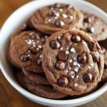 Chocolate Peanut Butter Bliss Cookies are a delectable treat that harmonizes the rich, nutty flavor of creamy peanut butter with the sweet indulgence of semi-sweet chocolate chips. Whether you are celebrating a special occasion, hosting a casual gathering, or simply craving something sweet at home, these cookies provide a perfect balance of texture and taste that will delight your palate. With a delightfully chewy center and a slightly crisped edge, they are a must-try for any cookie lover.