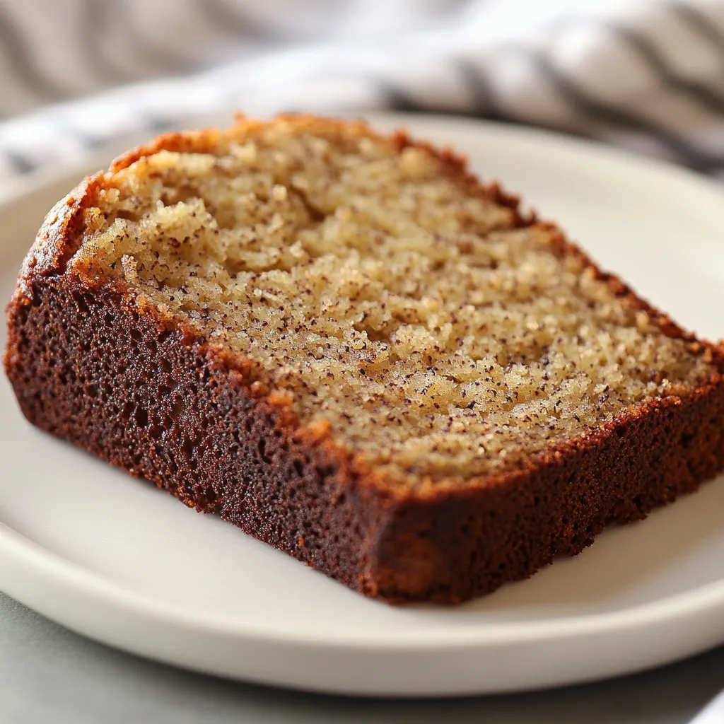 Banana bread is a cherished dessert in American cuisine, enjoyed by many for its rich flavors and comforting texture. The delightful aroma of freshly baked banana bread wafting through the kitchen evokes a sense of home, making it a favorite among families and friends. This simple loaf is not only a delicious treat for breakfast or a snack but also serves as an excellent way to use overripe bananas that might otherwise go to waste.