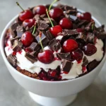 Exploring the rich and indulgent world of desserts often leads to delightful creations that blend flavors, textures, and visual appeal. Among the most celebrated is the German classic—Black Forest cake, transformed into a charming trifle. This Decadent Black Forest Trifle Delight not only captures the essence of its namesake but elevates it with layers of chocolate cake, creamy whipped topping, and tart cherry pie filling. Perfect for special occasions or an impressive after-dinner treat, this recipe delivers both visual allure and a harmonious blend of sweet and tangy flavors.