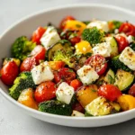 The magic of combining fresh vegetables with cheese creates a dish that is as nutritious as it is delicious. This Cheesy Roasted Vegetable Delight brings together a medley of vibrant vegetables and rich cheeses, harmonizing flavors to create a delightful culinary experience. The combination of textures from the roasted vegetables, alongside the creamy melted cheese, elevates this dish to an exceptional level. Perfect for gatherings or a cozy family dinner, it can be served as a main dish or a side, making it versatile enough to suit various occasions.