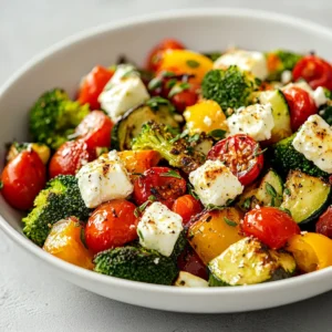 The magic of combining fresh vegetables with cheese creates a dish that is as nutritious as it is delicious. This Cheesy Roasted Vegetable Delight brings together a medley of vibrant vegetables and rich cheeses, harmonizing flavors to create a delightful culinary experience. The combination of textures from the roasted vegetables, alongside the creamy melted cheese, elevates this dish to an exceptional level. Perfect for gatherings or a cozy family dinner, it can be served as a main dish or a side, making it versatile enough to suit various occasions.