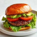 The Emu Burger Delight is a unique and delicious take on the classic American burger, presenting a nutritious alternative for meat lovers and health-conscious individuals alike. Emu meat, derived from the flightless bird native to Australia, offers a tender, juicy texture that is lower in fat than traditional beef while being rich in protein and essential vitamins. This makes it a fantastic option for those looking to explore new flavors without compromising on their nutritional goals.