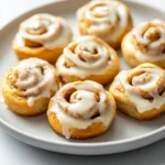 Delve into the world of homemade breakfast and dessert delights with these delightful mini cinnamon rolls. Ideal for those who enjoy the comforting aroma of cinnamon and the sweetness of a classic pastry, these mini rolls are quick and easy to prepare. Whether you're looking for a savory start to your day or a delightful treat to accompany your afternoon coffee, this recipe is perfect for all occasions.