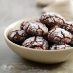 Exploring the perfect blend of chocolate and peppermint, this recipe for Chocolate Peppermint Crinkle Cookies captures the spirit of the holiday season. These delightful cookies are not only packed with rich chocolate flavor but also infused with refreshing peppermint, making them a favorite treat during festive times. The crinkle effect delivers a visually appealing contrast against the classic snowy powdered sugar coating, making these cookies an eye-catching addition to any holiday spread.