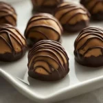 Exploring the delightful world of no-bake desserts reveals a treasure trove of flavors and textures, and one such irresistible treat is the Decadent Peanut Butter Crunch Balls with Chocolate Drizzle. This recipe combines the creamy richness of peanut butter with the satisfying crunch of Rice Krispies, finished with a luscious chocolate drizzle. The appealing feature of this dessert is that it requires no baking, making it a perfect option for those looking to whip up something sweet with minimal effort.