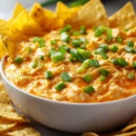 Understanding the allure of Game Day foods, this Zesty Buffalo Chicken Dip stands out as a fan favorite. As gatherings become more vibrant and spirited, the need for tasty appetizers rises, and this dip perfectly caters to that craving. The creamy, spicy concoction is a delightful mix that not only intrigues the palate but also fosters an atmosphere of shared enjoyment among friends and family. Whether you are hosting a major game day party or just looking for a special dish to accompany your casual snacking, this dip is designed to elevate your appetizer game.
