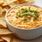 Buffalo Chicken Dip is the ultimate blend of creamy, spicy, and savory flavors that makes it a favorite for gatherings and game-day snacks. This dish has become synonymous with parties, BBQs, and sports events, thanks to its deliciously addictive qualities. It strikes the perfect balance between rich, creamy textures and zesty flavors that are sure to tantalize your taste buds.