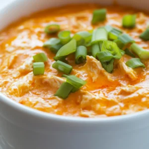 Buffalo Chicken Dip has established itself as a staple in American appetizers, known for its rich flavor and creamy texture that ignites a taste sensation with every bite. Its irresistible blend of spicy buffalo sauce and creamy ingredients creates a perfect harmony, making it a fan favorite at gatherings, game days, and parties. Whether you’re hosting a Super Bowl party, a tailgate, or simply enjoying a casual evening with friends, this dip is sure to satisfy your cravings for something savory and succulent.