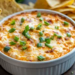 Buffalo Chicken Dip is a delightful blend of flavors that elevates any gathering or casual get-together. This dish seamlessly marries the classic taste of buffalo chicken wings with the creamy texture of cheese and ranch dressing. It’s a crowd favorite, especially at parties, game days, or potlucks, where its irresistible appeal never fails to make an impression. Whether you’re hosting friends for a weekend game or simply indulging in a cozy night at home, this easy and cheesy dip is sure to be a hit.